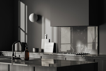 Grey kitchen interior with bar countertop and cooking area closeup