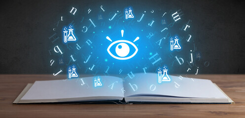 Open medical book with health icons above