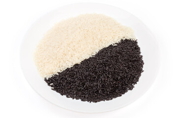 Raw black and white rice on dish on white background