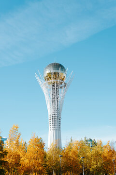 Baiterek monument and observation tower in Astana. Vertical view of modern architecture against a blue sky on a sunny autumn day. Kazakhstan, Astana 14.10.2022