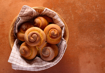 Fototapeta na wymiar Homemade spiral shaped sweet bread