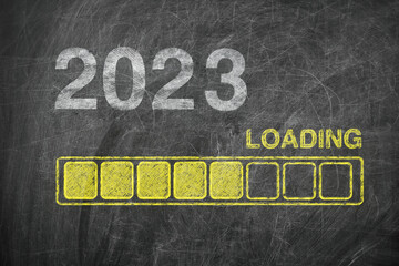 Progress Bar Showing Loading of 2023 New Year on Chalkboard
