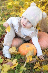 little girl in in autumn park