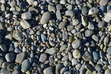 Very many small gray stones on top of each other