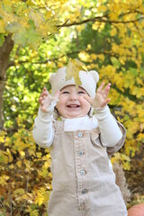 little girl in in autumn park