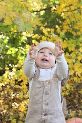 little girl in in autumn park