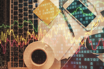 Fototapeta na wymiar Double exposure of financial chart drawing over table background with computer. Concept of research and analysis. Top view.