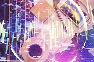 Business theme hologram drawings over computer on the desktop background. Top view. Multi exposure. Concept of international connections.