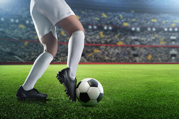 Obraz premium Soccer player on grass stadium, Kicking ball