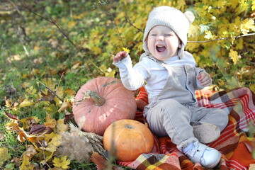 little girl in in autumn park