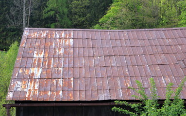 Old metal sheet roof texture. Pattern of old metal sheet