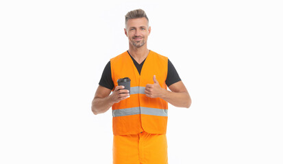 happy builder supervisor man in orange uniform. builder man wearing working reflective vest.