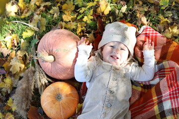 little child with pumpkin