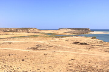 View from Khor Rori and Sumhuram historical Unesco site in Taqah to the sea in the oman - obrazy, fototapety, plakaty
