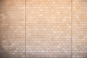 Fototapeta premium yellow Brick wall background. Stone wall background.