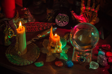 Witch altar. Concept of fortune telling and predictions of fate, candle magic and wicca elements on a table