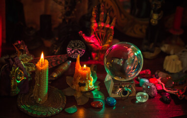 Witch altar. Concept of fortune telling and predictions of fate, candle magic and wicca elements on a table