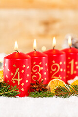 Fourth 4th Sunday in advent with candle Christmas time decoration portrait format