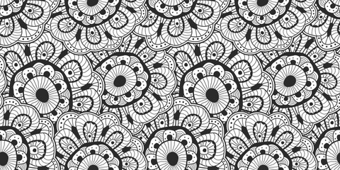 Black and white floral scribble illustration. Abstract vector hand drawn flower seamless background.