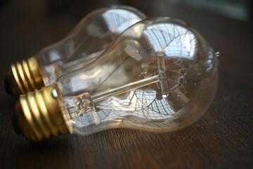 Closeup shot of Vintage light bulbs on wooden surface
