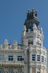 A white building with lots of details