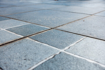Fototapeta premium Outdoor rooftop tiles attached in symmetry with each other at right angle. India
