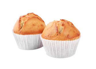 Tasty muffins in paper cups on white background