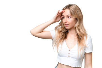 Fototapeta premium Young English woman over isolated background with surprise expression while looking side