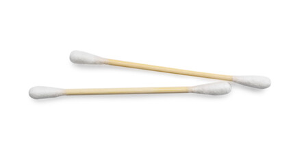 Wooden cotton buds on white background, top view