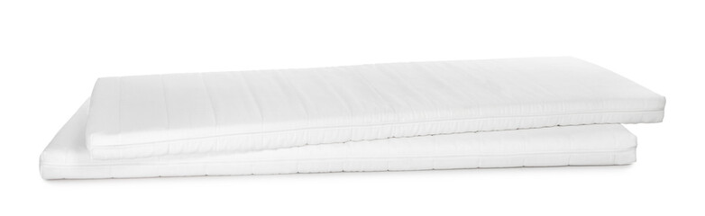 Fototapeta premium Two new comfortable mattresses isolated on white