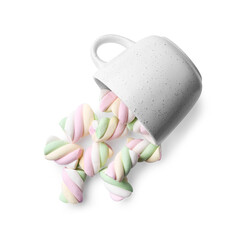 Overturned cup of delicious colorful marshmallows on white background, top view