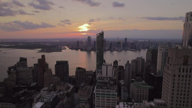 Aerial view of Manhattan in sunset rime. Skyscrapers in New York. Wall street of down town NYC.