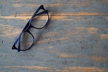 Blue glasses on wooden table