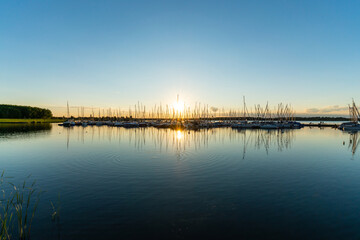 Sunset behind the harbor of the Cospudener Lake near Leipzig 