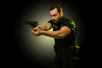 Policeman using his gun to arrest a criminal