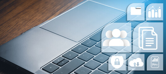 Laptop desktop with Document Management System DMS interface. Digital file storage. Database technology. Corporate business.