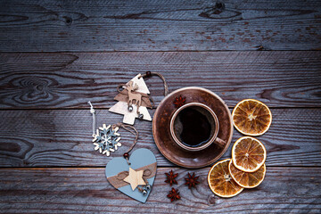 Christmas background with a cup of coffee and decorations. Flatley with copy space. Celebrating Christmas and New Years.