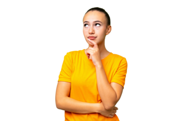 Young Arab woman over isolated background and looking up