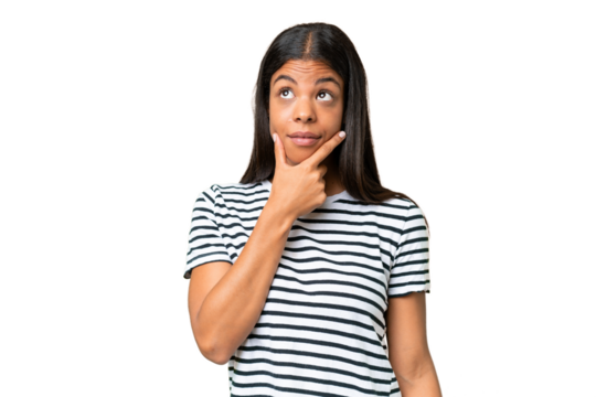 Young African american woman over isolated background thinking an idea while looking up - Powered by Adobe