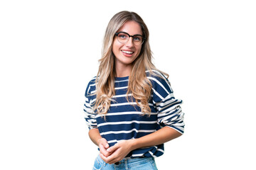Young Uruguayan woman over isolated background laughing
