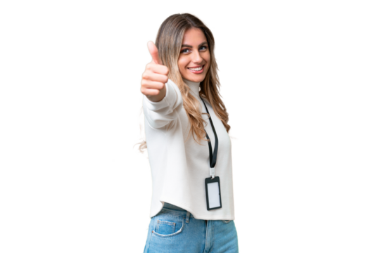 Young Uruguayan woman with ID card over isolated background with thumbs up because something good has happened