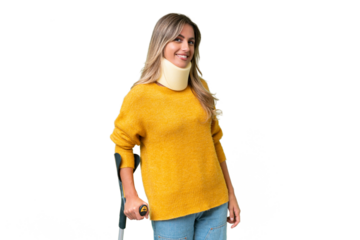 Young Uruguayan woman wearing neck brace and crutches over isolated background with happy expression