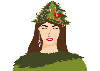 Female portrait. Girl dressed as a Christmas tree. Festive Christmas mood.