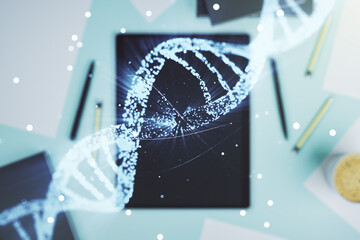 Creative DNA sketch and modern digital tablet on background, biotechnology and genetic concept. Multiexposure
