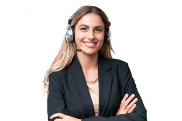 Telemarketer pretty Uruguayan woman working with a headset over isolated background keeping the arms crossed in frontal position