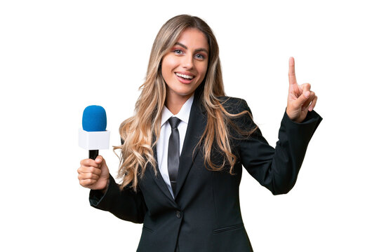 Young pretty Uruguayan tv presenter over isolated background showing and lifting a finger in sign of the best