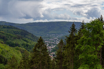 Fototapeta na wymiar weather clouds over the forest in Germanys Odenwald region