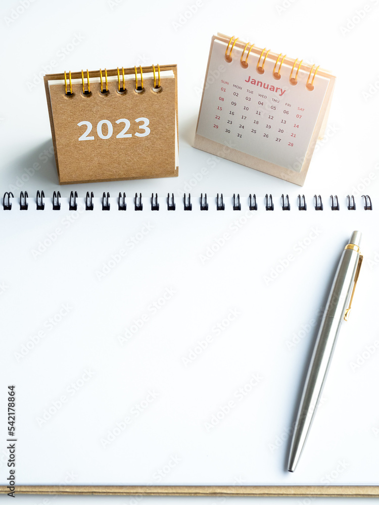 Aufkleber 2023 to do list concept. white blank space on spiral notepad, horizontal style with pen and 2023 yea