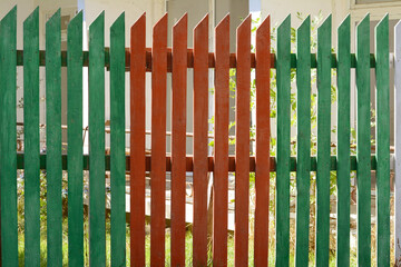 Fototapeta premium Wooden fence on sunny day outdoors, closeup