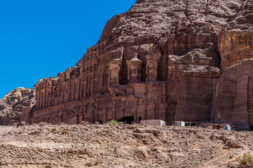 A side view of the Royal Tombs in the ancient city of Petra, Jordan in summertime